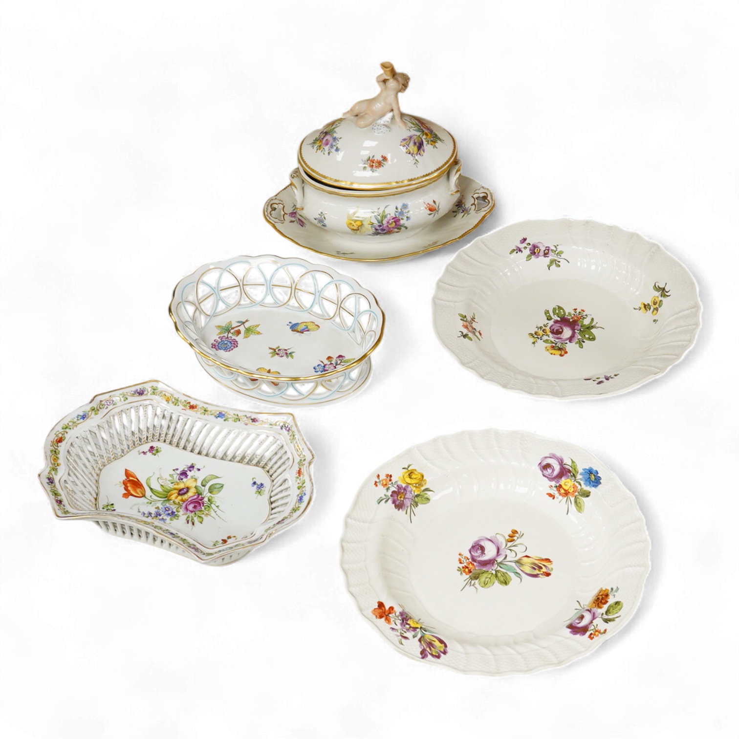 A Copenhagen putti tureen and cover-21cm high, a Herend basket, two Vienna type dishes and similar basket